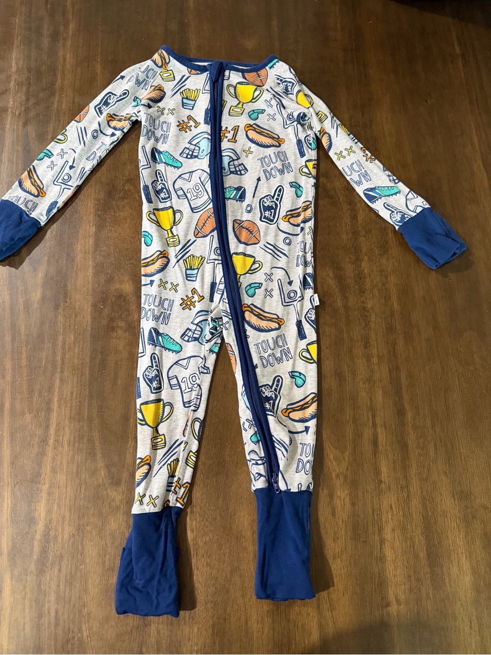 Little Sleepies Blue & White Football Print Footed One-Piece